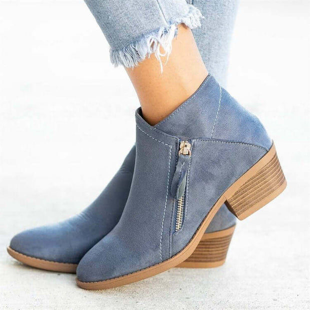 Professional blue suede ankle boots for women, featuring a round toe, wedge heel, and stylish side zipper.