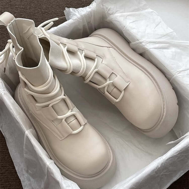 Stylish beige Martin boots with thick sole, lace-up design in a shoebox, perfect for fashionable women.