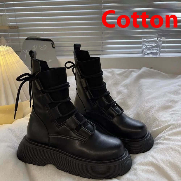 Martin Boots Women's black lace-up booties with thick rubber sole, perfect for stylish and professional looks.