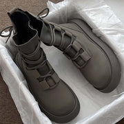 Martin boots for women in olive green with thick rubber sole and front lace-up design, perfect for stylish comfort.